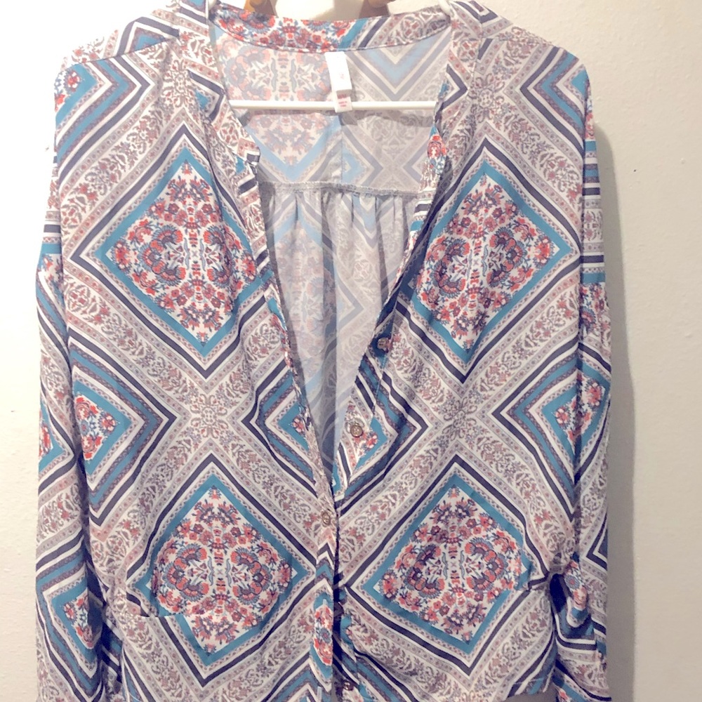 Very cute blazer blouse thin material